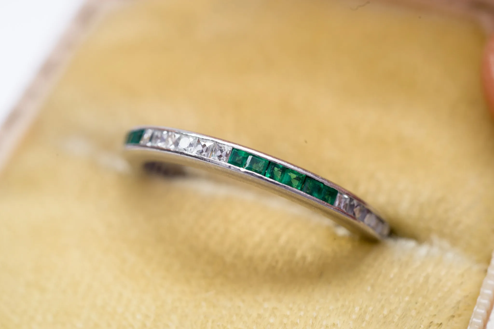 ART DECO FRENCH CUT DIAMOND AND NATURAL EMERALD ETERNITY BAND