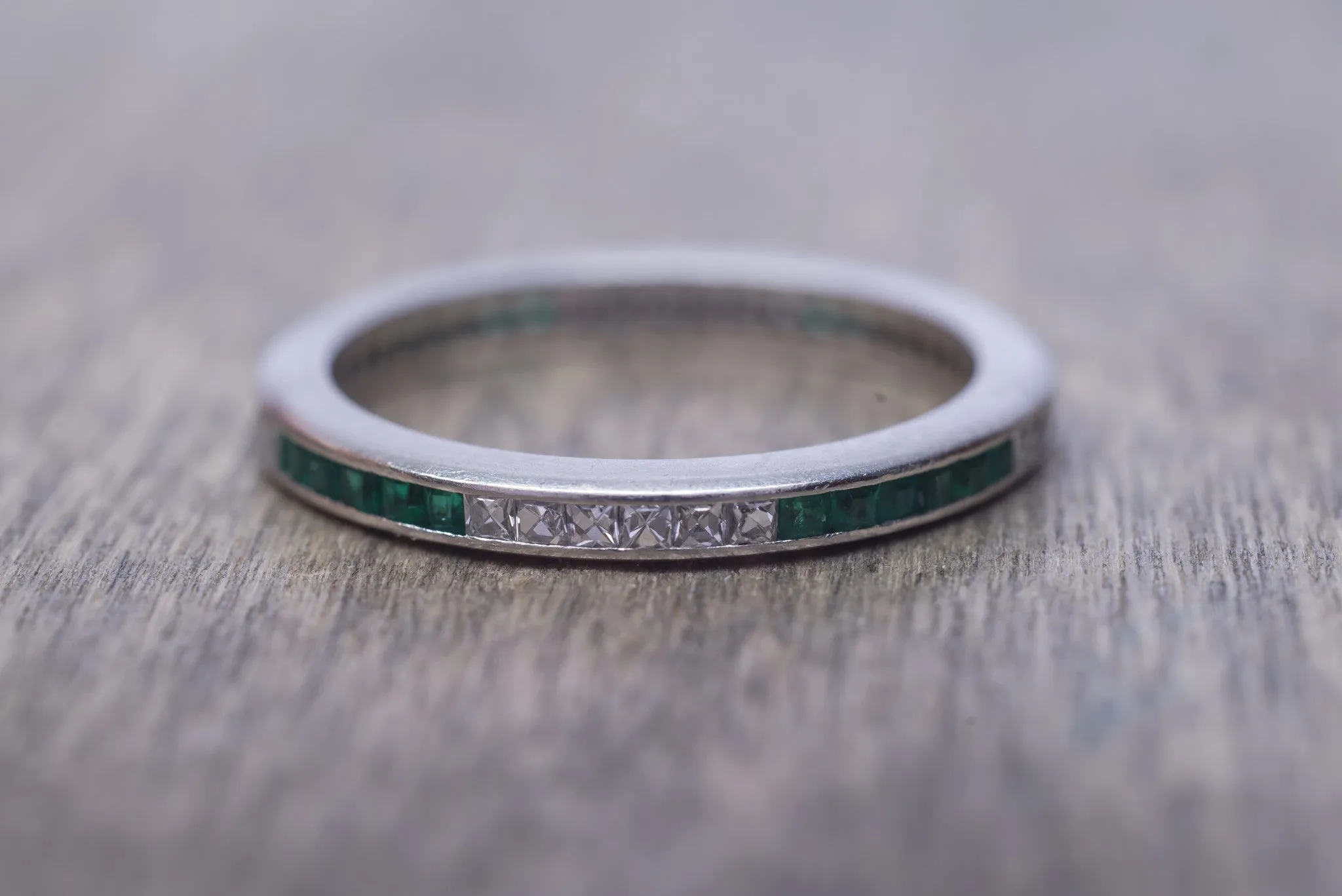 ART DECO FRENCH CUT DIAMOND AND NATURAL EMERALD ETERNITY BAND