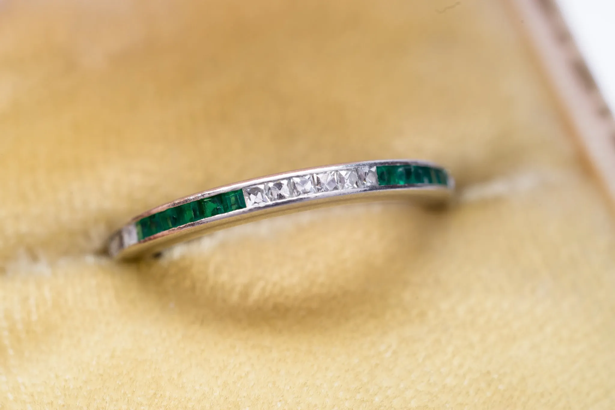 ART DECO FRENCH CUT DIAMOND AND NATURAL EMERALD ETERNITY BAND