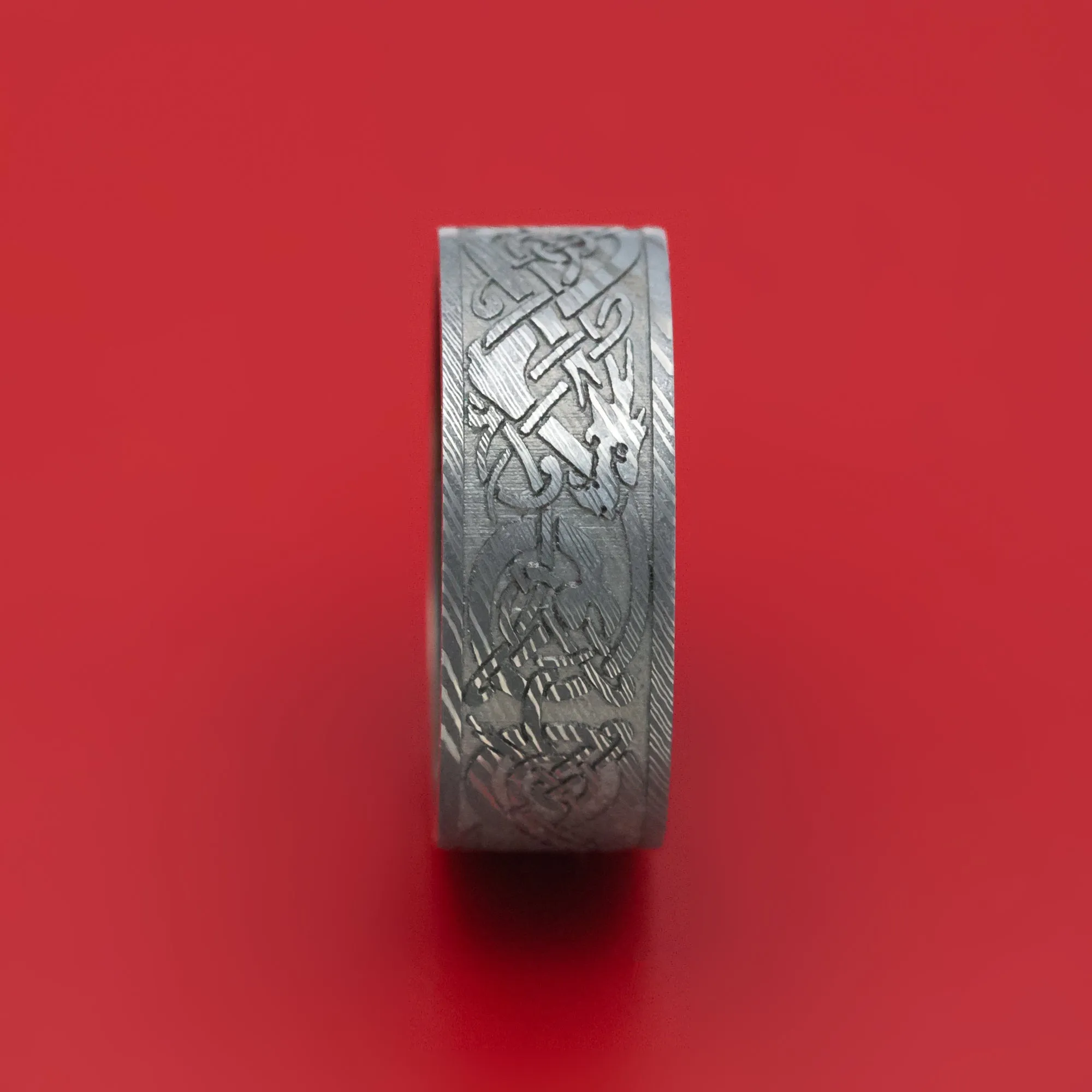 Damascus Steel Celtic Dragon Ring with Wood Sleeve