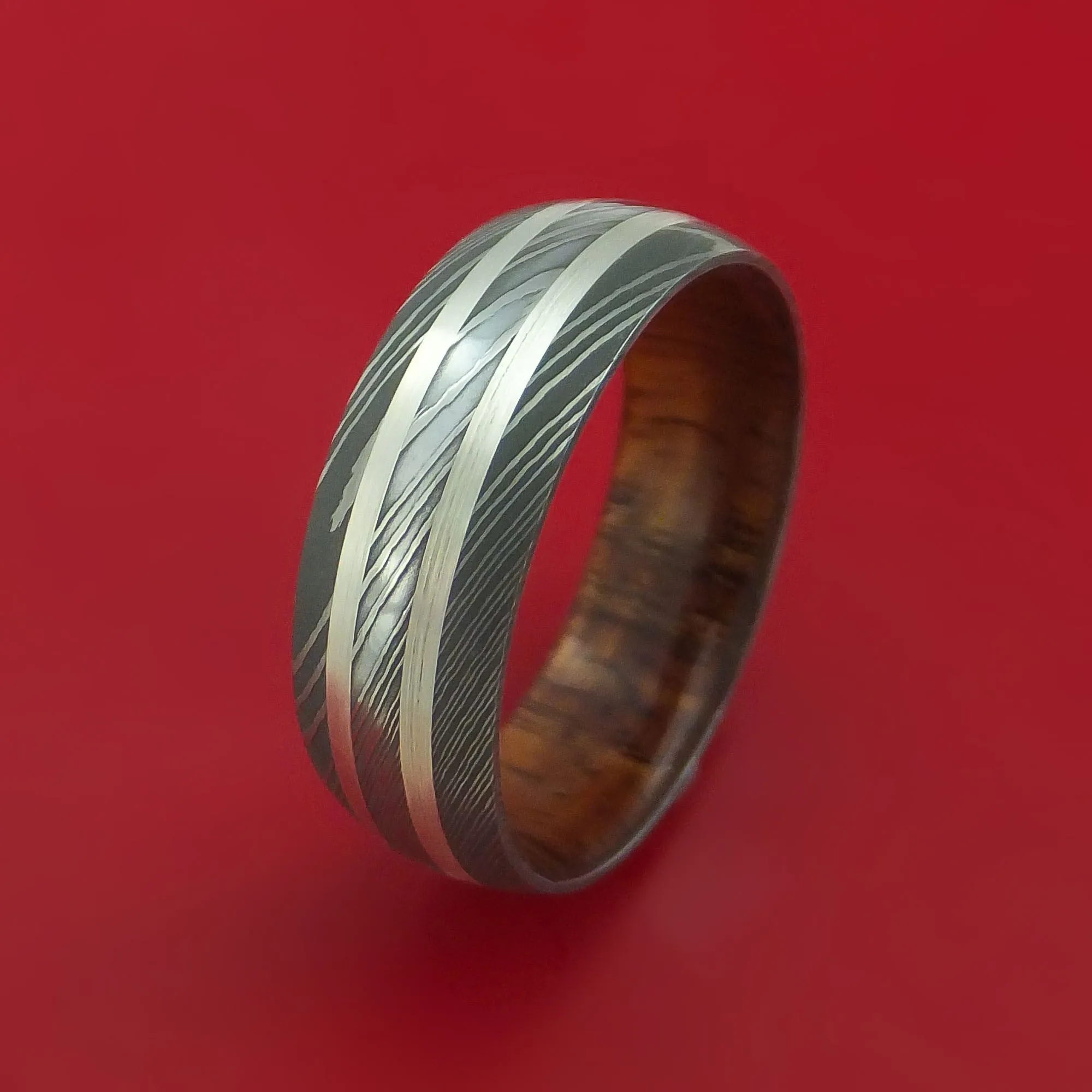 Damascus Steel Ring with Silver Inlays and Koa Hard Wood Sleeve