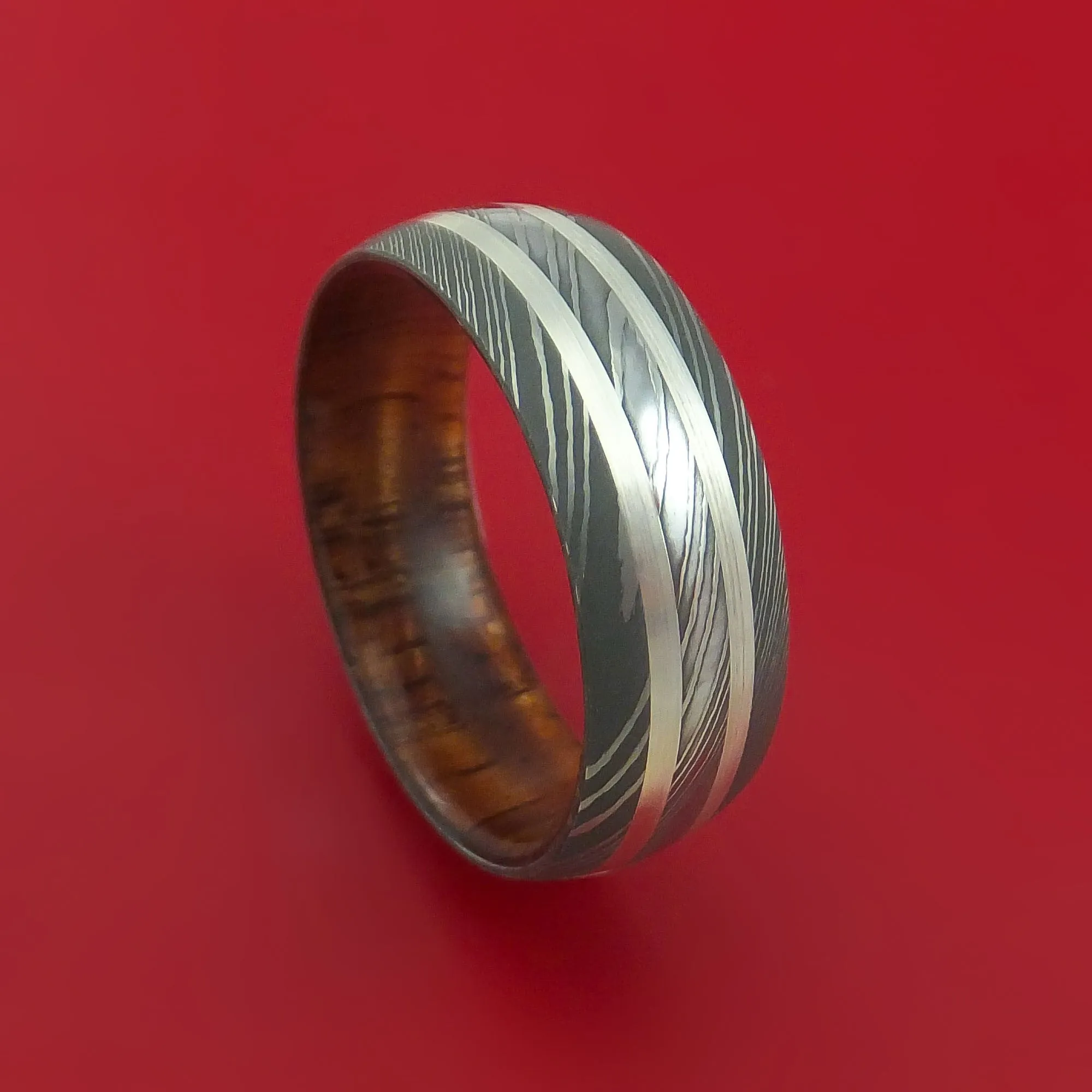 Damascus Steel Ring with Silver Inlays and Koa Hard Wood Sleeve