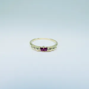 Ellipsis Baguette Ruby Ring