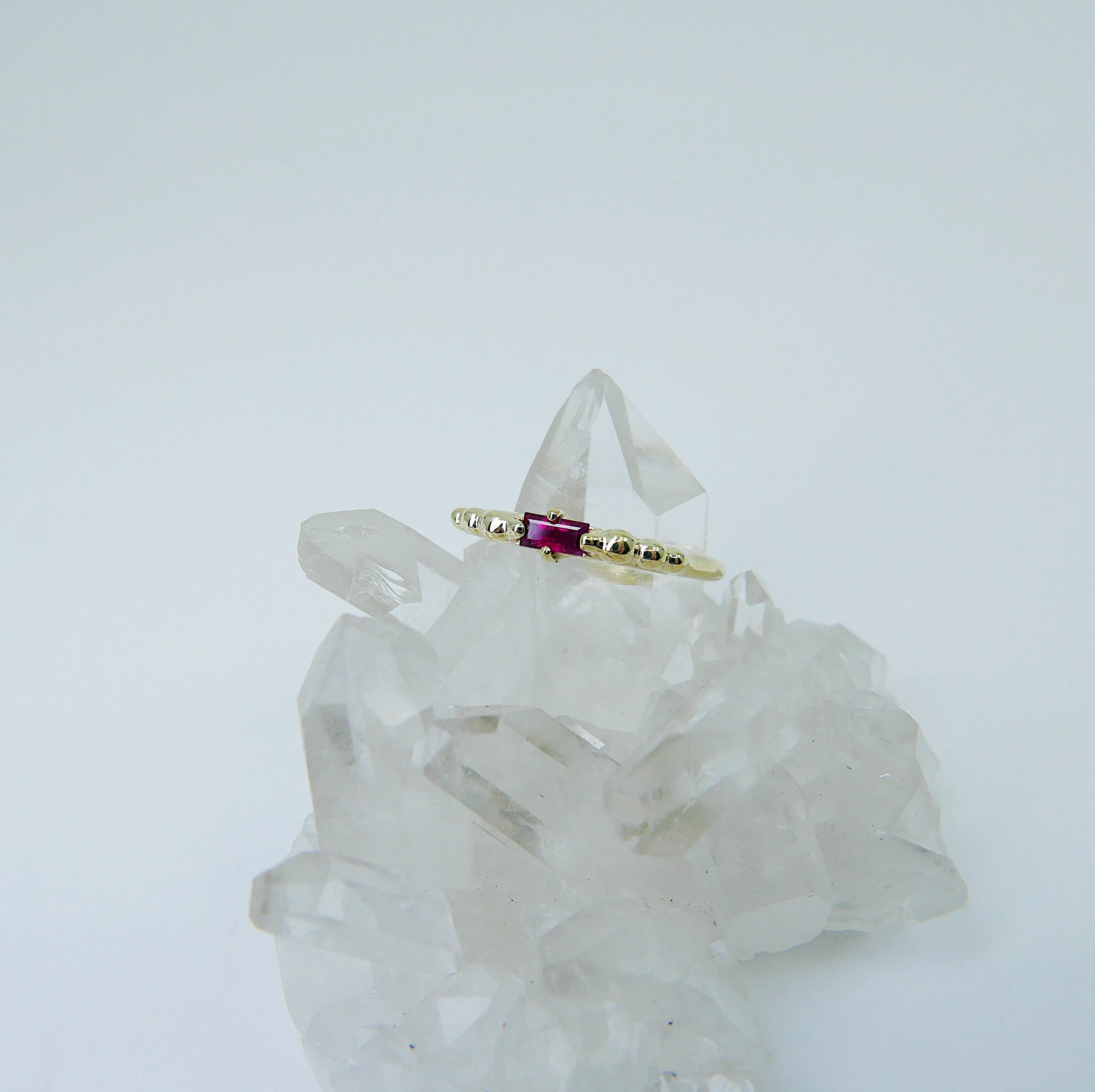 Ellipsis Baguette Ruby Ring