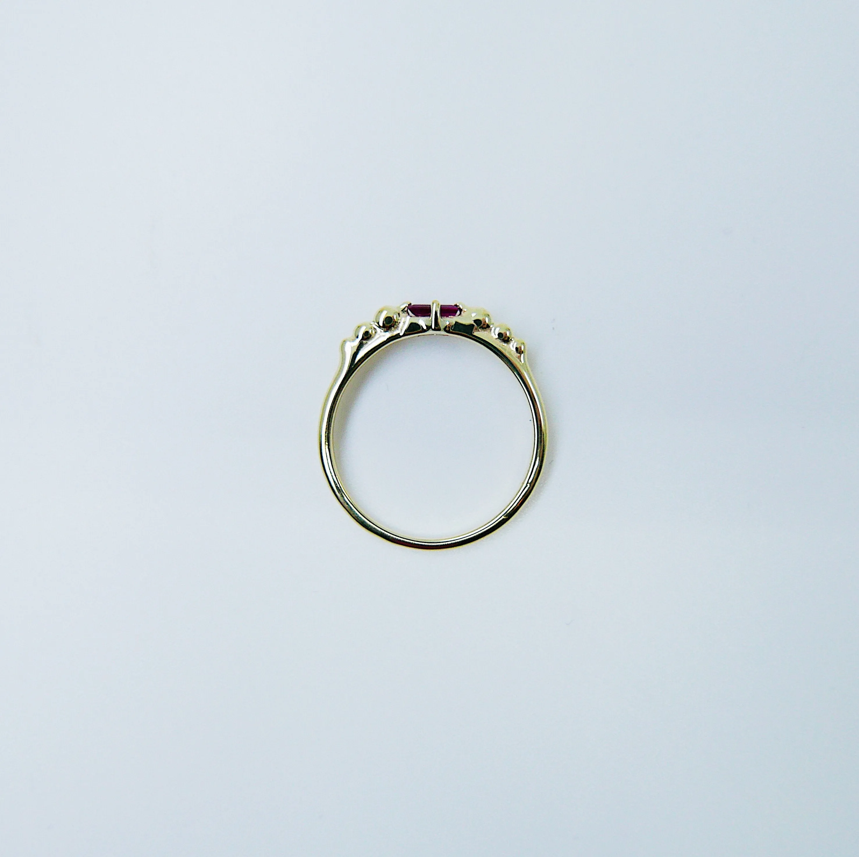 Ellipsis Baguette Ruby Ring