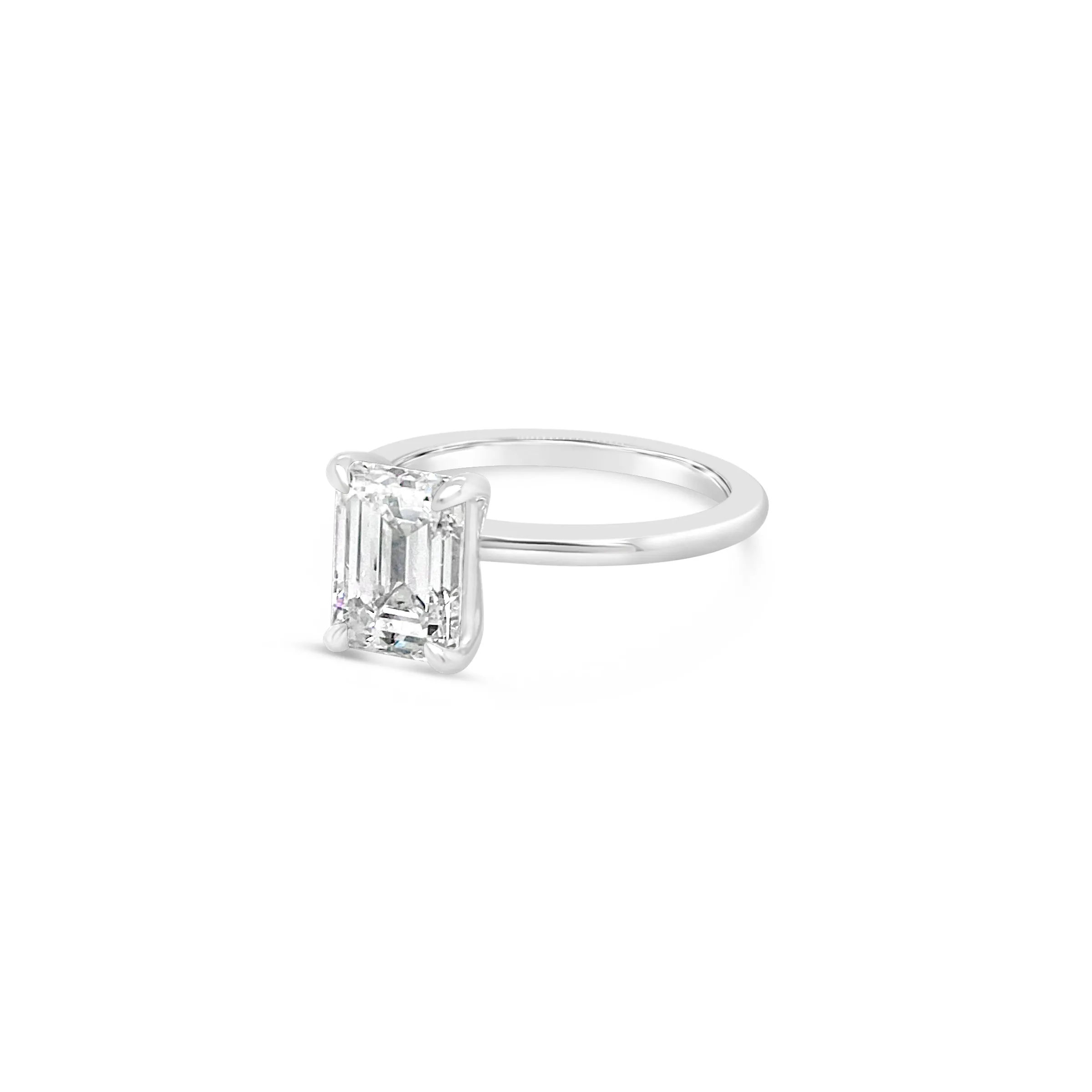 Emerald Solitaire Engagement Ring