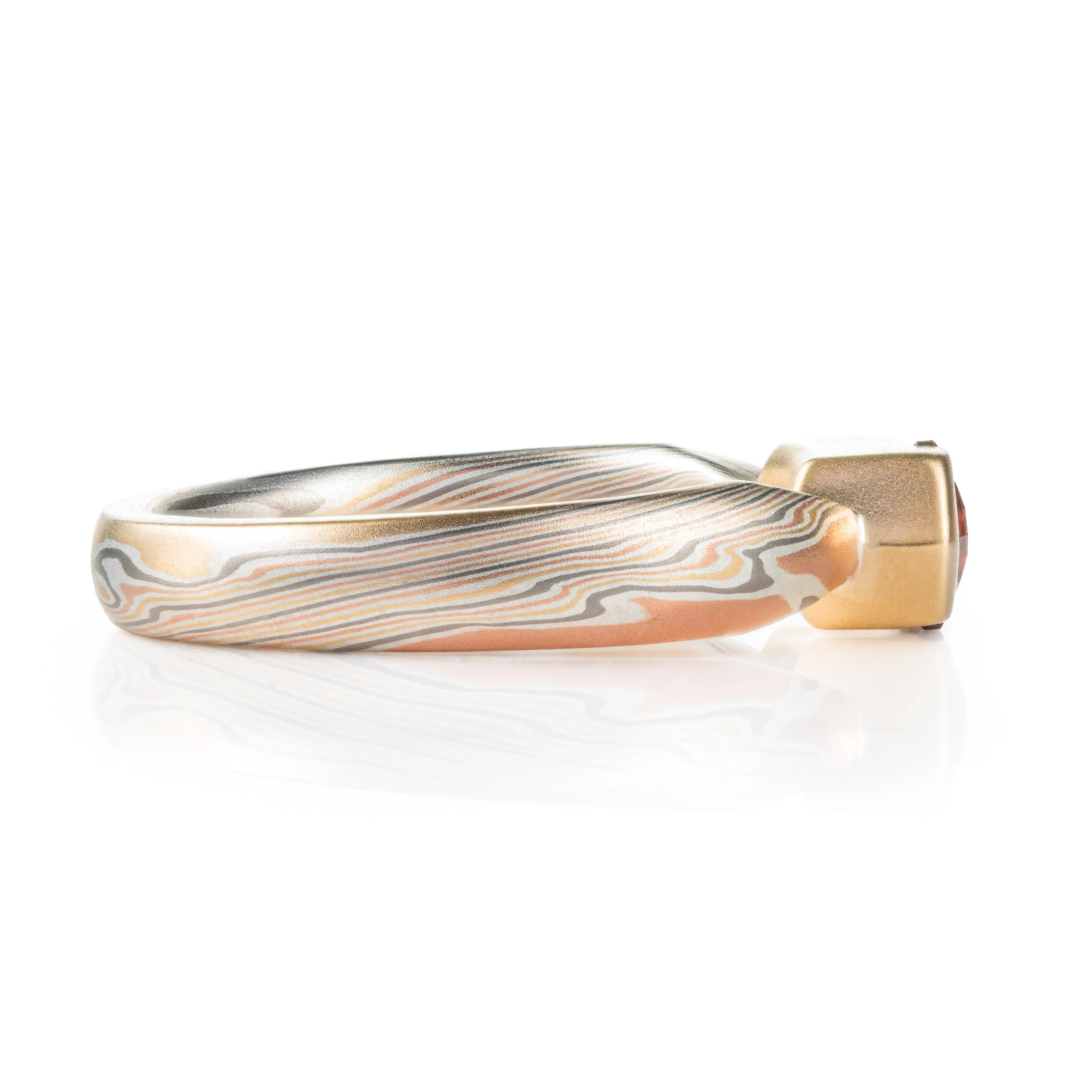 Enchanting Mokume Twist Pattern Ring with Dusky Rose Sapphire