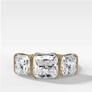 Half Bezel Triad Engagement Ring With Radiant Square Cut Diamonds