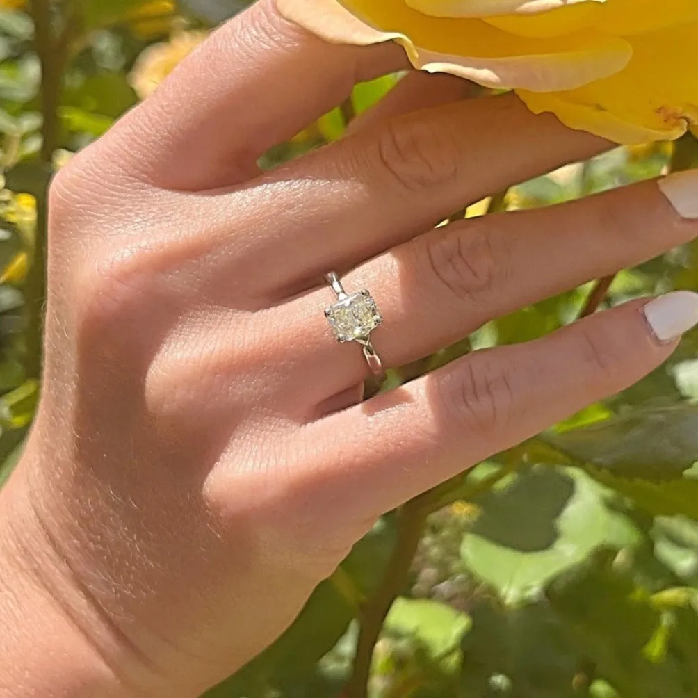 Platinum & 1.20ct Light Fancy Yellow Radiant Emerald Cut Diamond Solitaire Engagement Ring