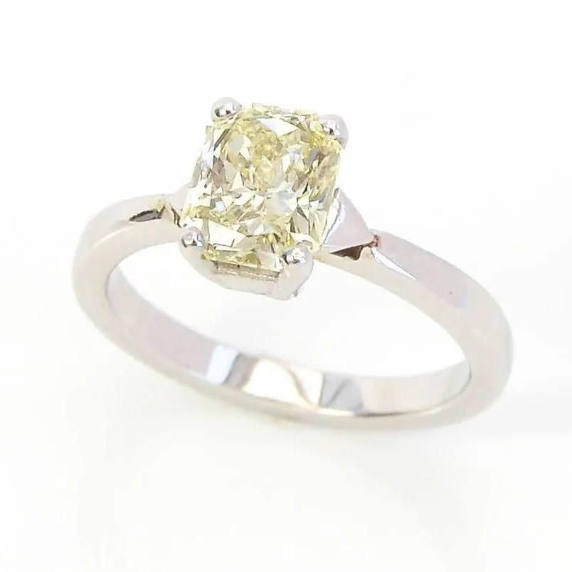 Platinum & 1.20ct Light Fancy Yellow Radiant Emerald Cut Diamond Solitaire Engagement Ring