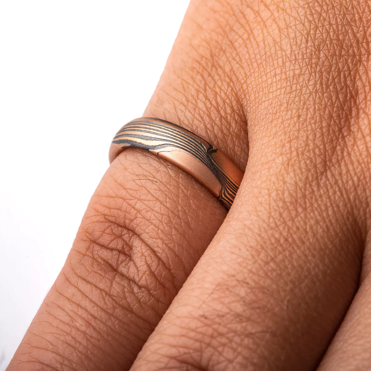 Smoldering Flow Pattern Ring with Red Gold Knots