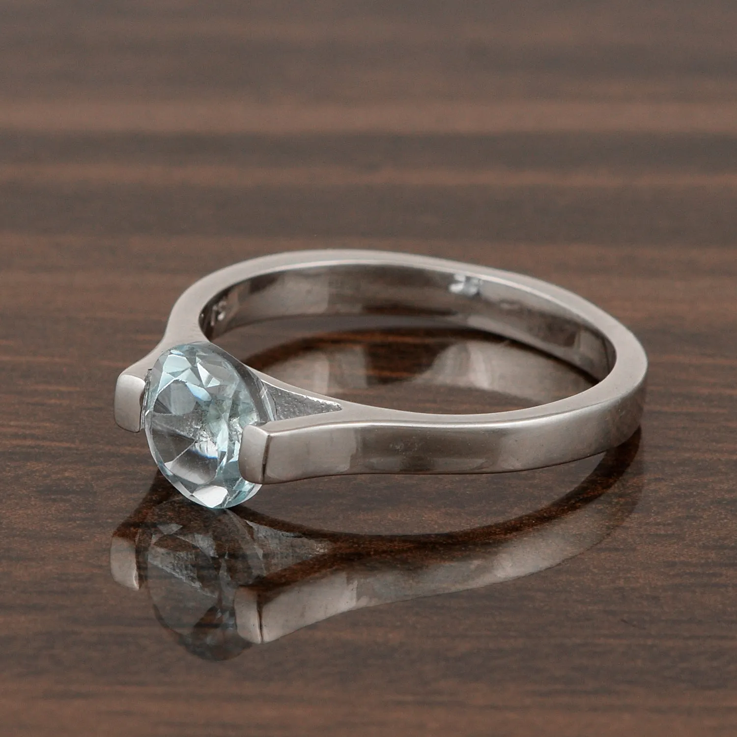 Solitaire 7mm Round Blue Topaz Gemstone Open Prong Ring