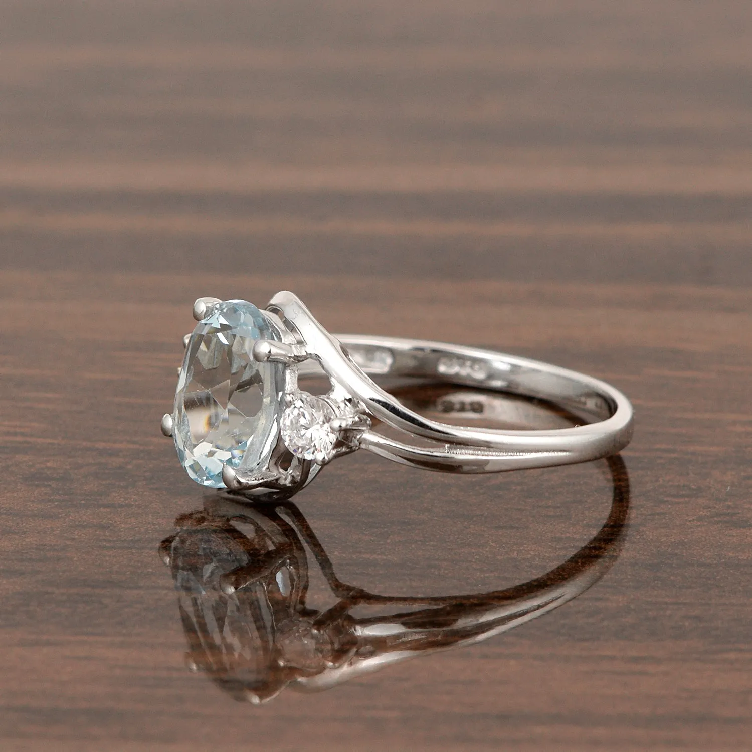 Sterling Silver Oval 2.25 Ctw Swiss Blue Topaz with White Topaz Accent Women Rings