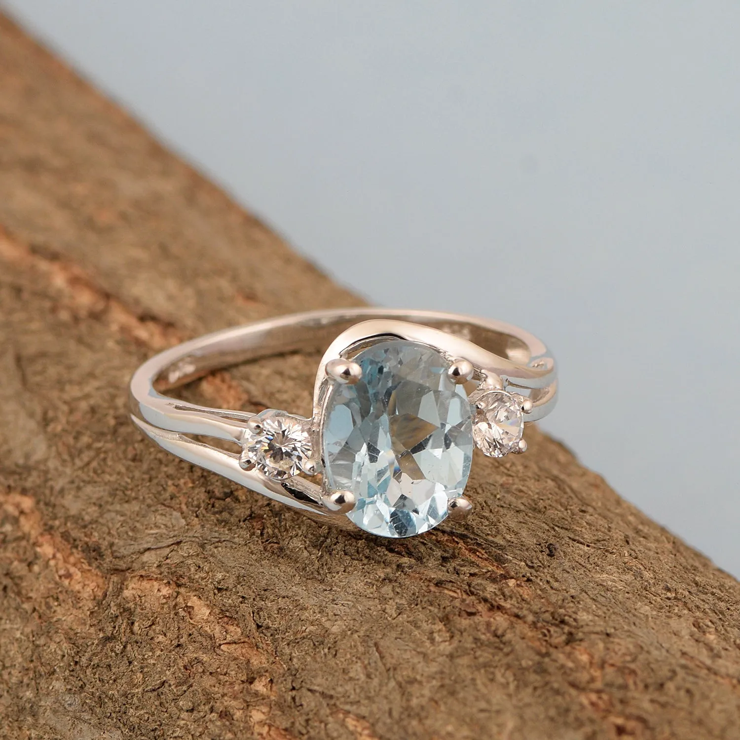 Sterling Silver Oval 2.25 Ctw Swiss Blue Topaz with White Topaz Accent Women Rings