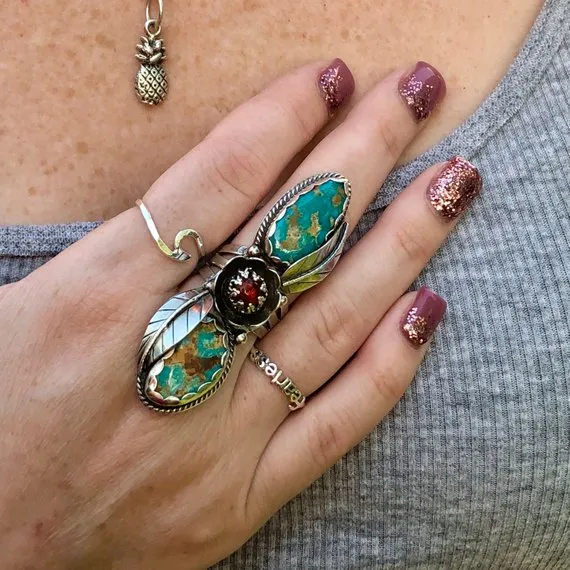 Turquoise flower Sterling Silver ring in a size 7 US